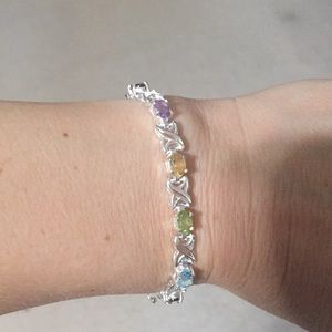 Silver bracelet with multicolored stones